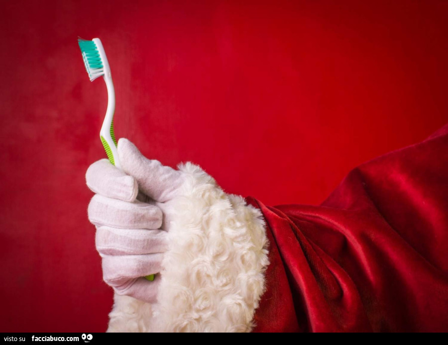 Babbo Natale con lo spazzolino da denti